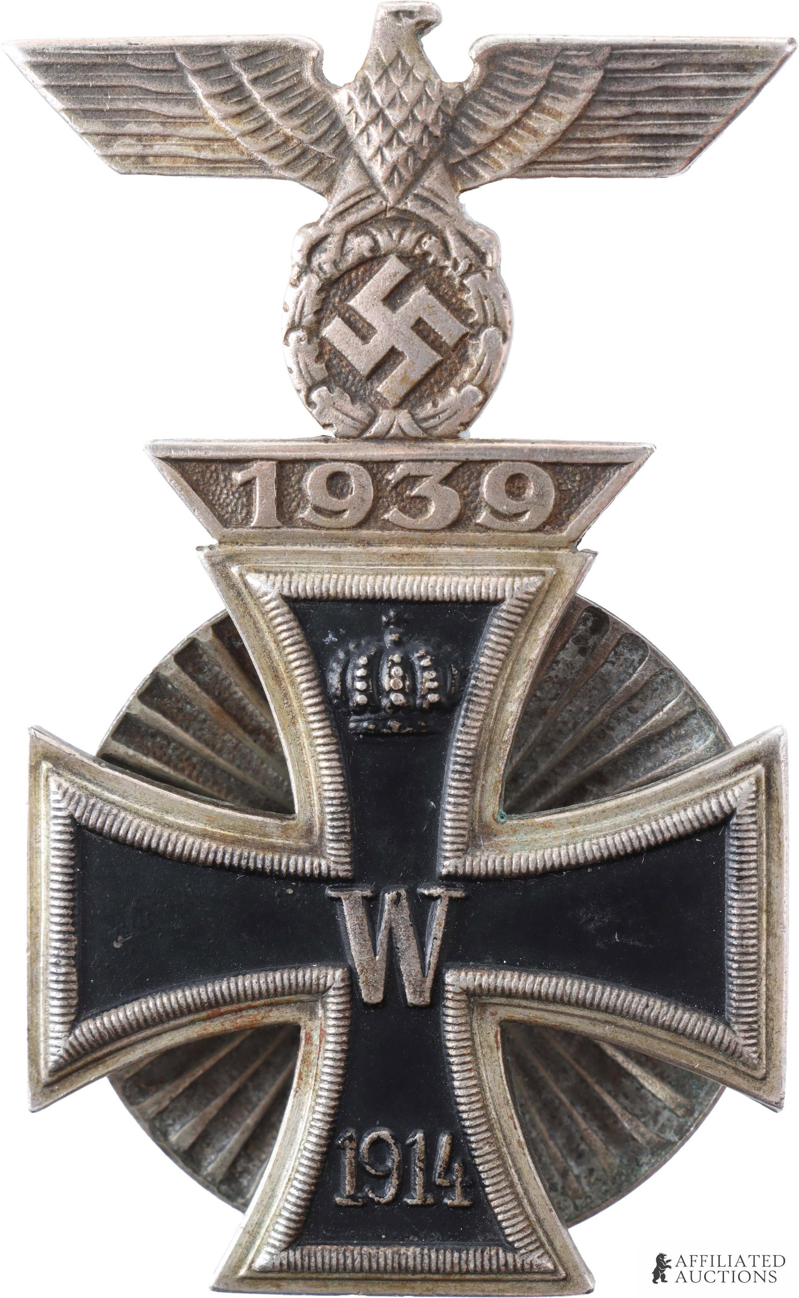 1914 Iron Cross 1st Class with 1939 Spange: 1914 Iron Cross, I Class, with 1939 spange. Reverse has vertical wire hook over screw-post ridged washer cup. Reverse has very small mark, possibly "46." Three-piece construction, silvered frame with 