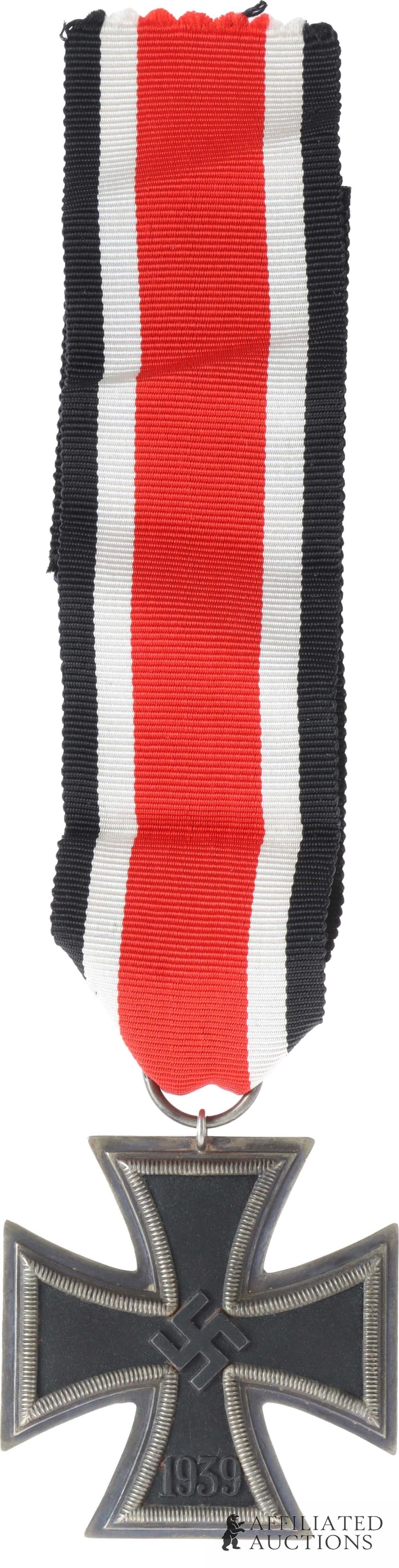 Iron Cross 2nd Class Borger & Co WWII German: WWII German Reich Iron Cross Second Class. Two piece frame with magnetic iron core. Ribbon ring is marked '22' for Boerger & Co. | This lot has a reserve.
