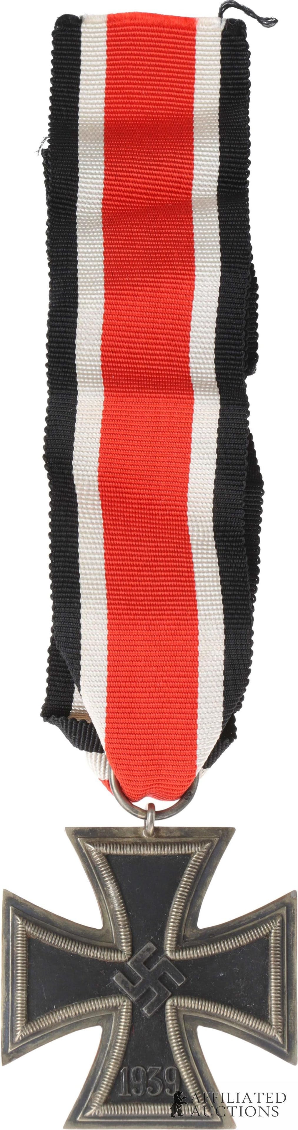 Iron Cross 2nd Class Otto Klein WWII German: WWII German Reich Iron Cross Second Class. Two piece frame with magnetic iron core. Ribbon ring is marked '65' for Otto Klein. Measures 45mm. | This lot has a reserve.