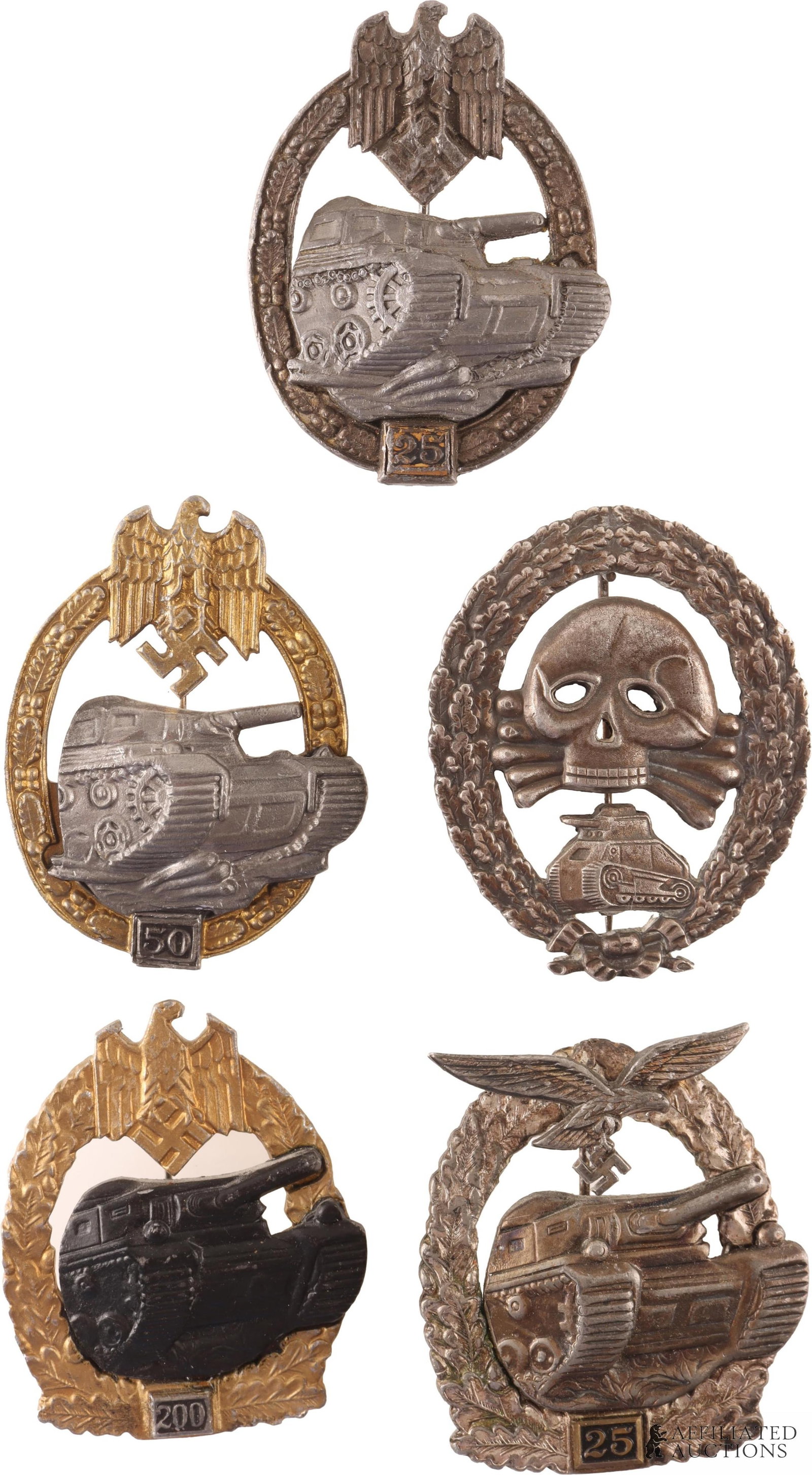 Lot 5 of WWII German Panzer Badges.: Lot 5 of WWII German panzer Badges. One Condor Legion tank badge. One Panzer Assault Badge for 50 engagements. Two Panzer Assault Badges for 25 engagements. One Panzer Assault Badge for 200 Engagement