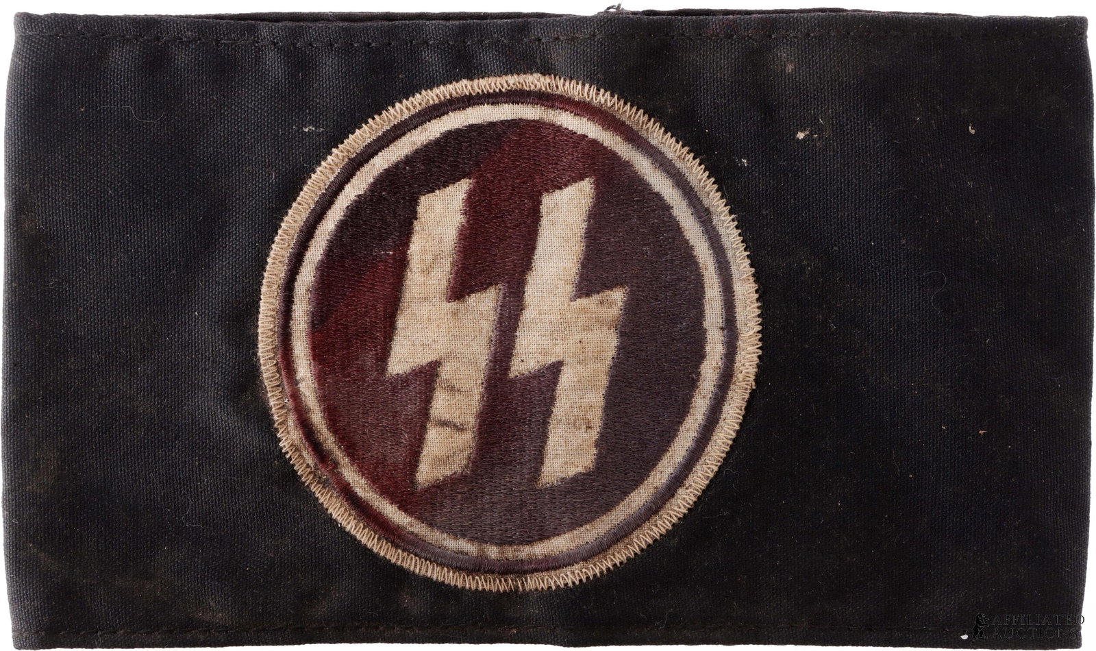 SS Medical Personnel Armband WWII German: SS medical personnel Black armband with white SS runes. Measures 5in x 9in./. | This lot has a reserve.