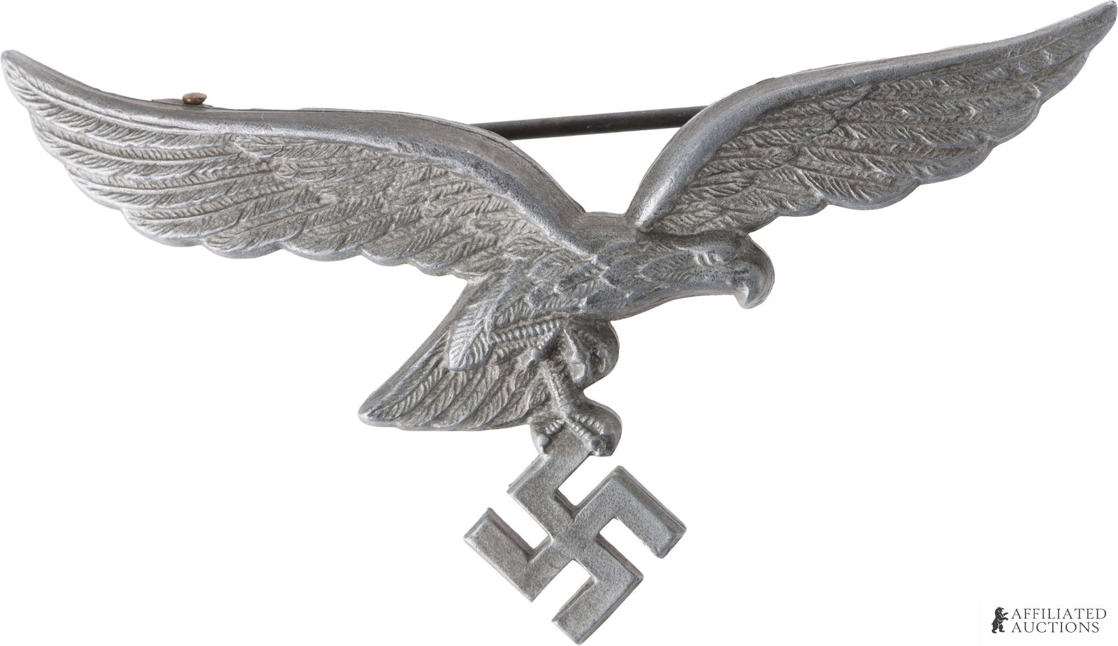 Luftwaffe Breast Eagle Pin WWII German Third Reich: A Luftwaffe breast eagle pin, to be worn with summer tunics. Marked on the reverse with 'A' maker's mark characteristic of the Assmann company. Measures 3 1/4" x 1 1/2" and weighs 22 grams. Very fine