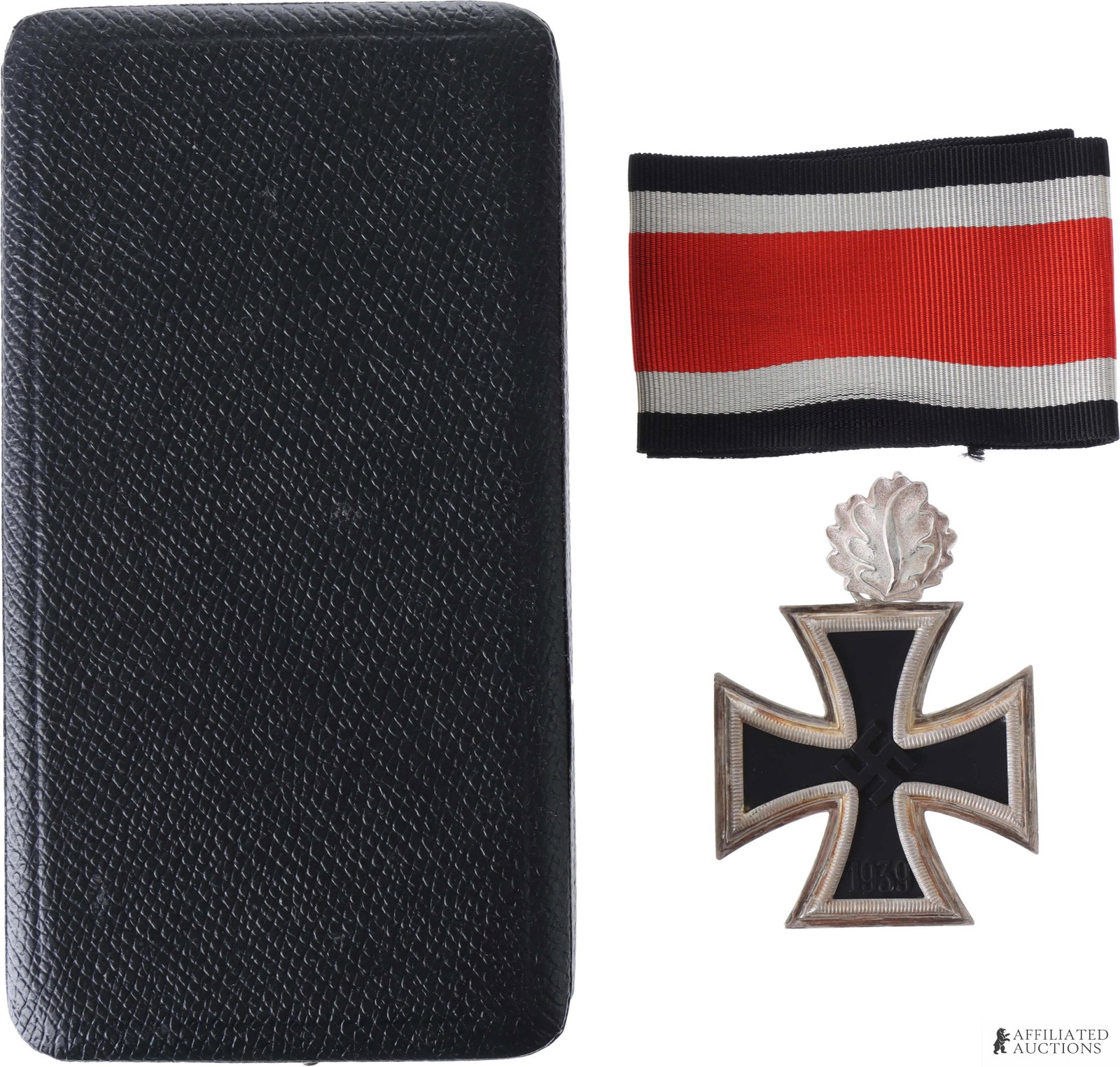 Knight's Cross of the Iron Cross with Oak Leaves: A Knight's Cross of the Iron Cross with Oak Leaves and ribbon in its black issue case. 935 silver frame, marked "4," with black magnetic core; oak leaves are marked on reverse "800" with maker's mark 