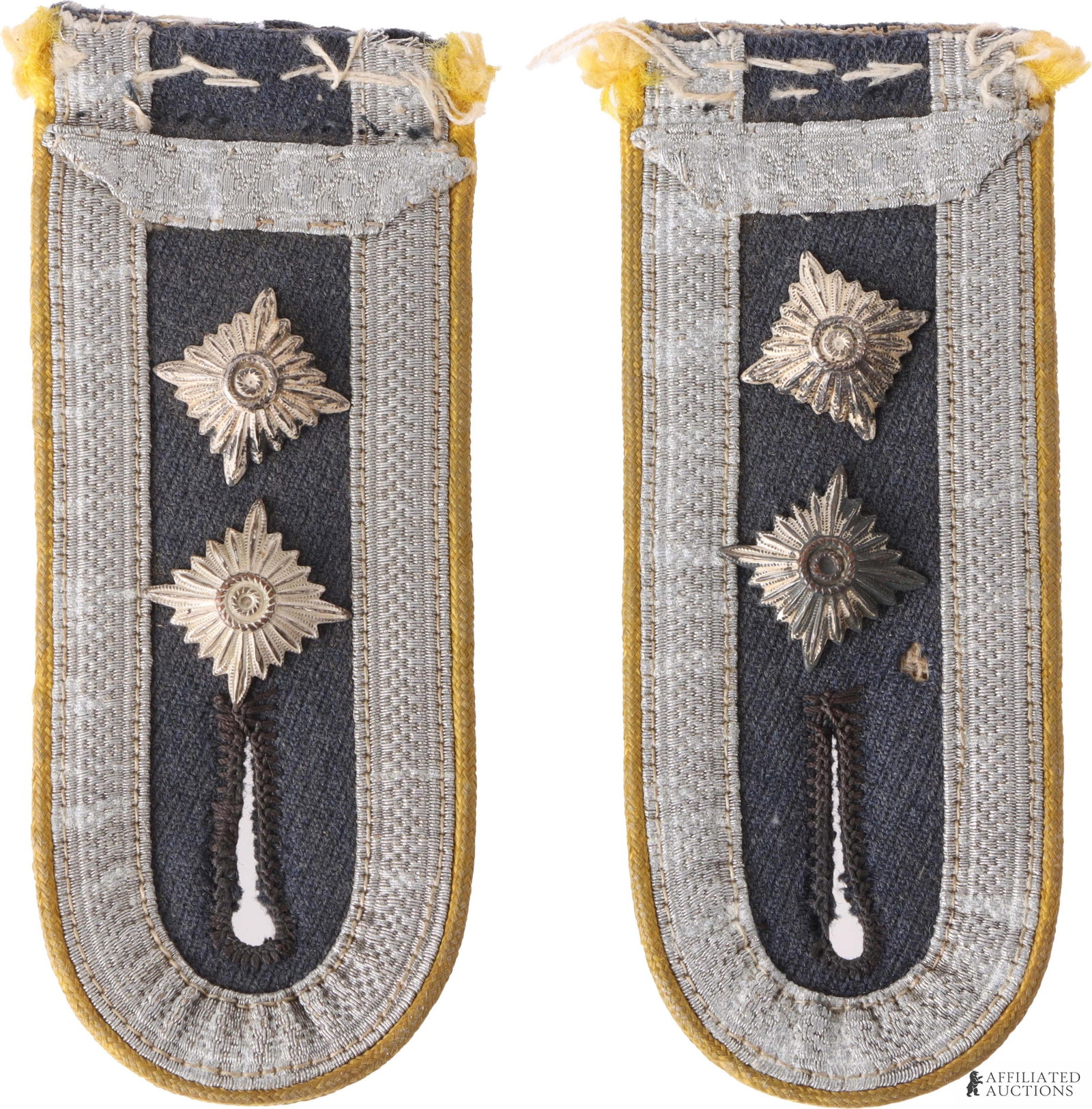 Luftwaffe NCO Shoulder Boards WWII German Reich: A pair of blue Luftwaffe Senior NCO shoulder boards, with yellow piping, aluminum bullion trim, and two Sterne/star pips each. Both shoulder boards are in fine condition, with light wear due to age an
