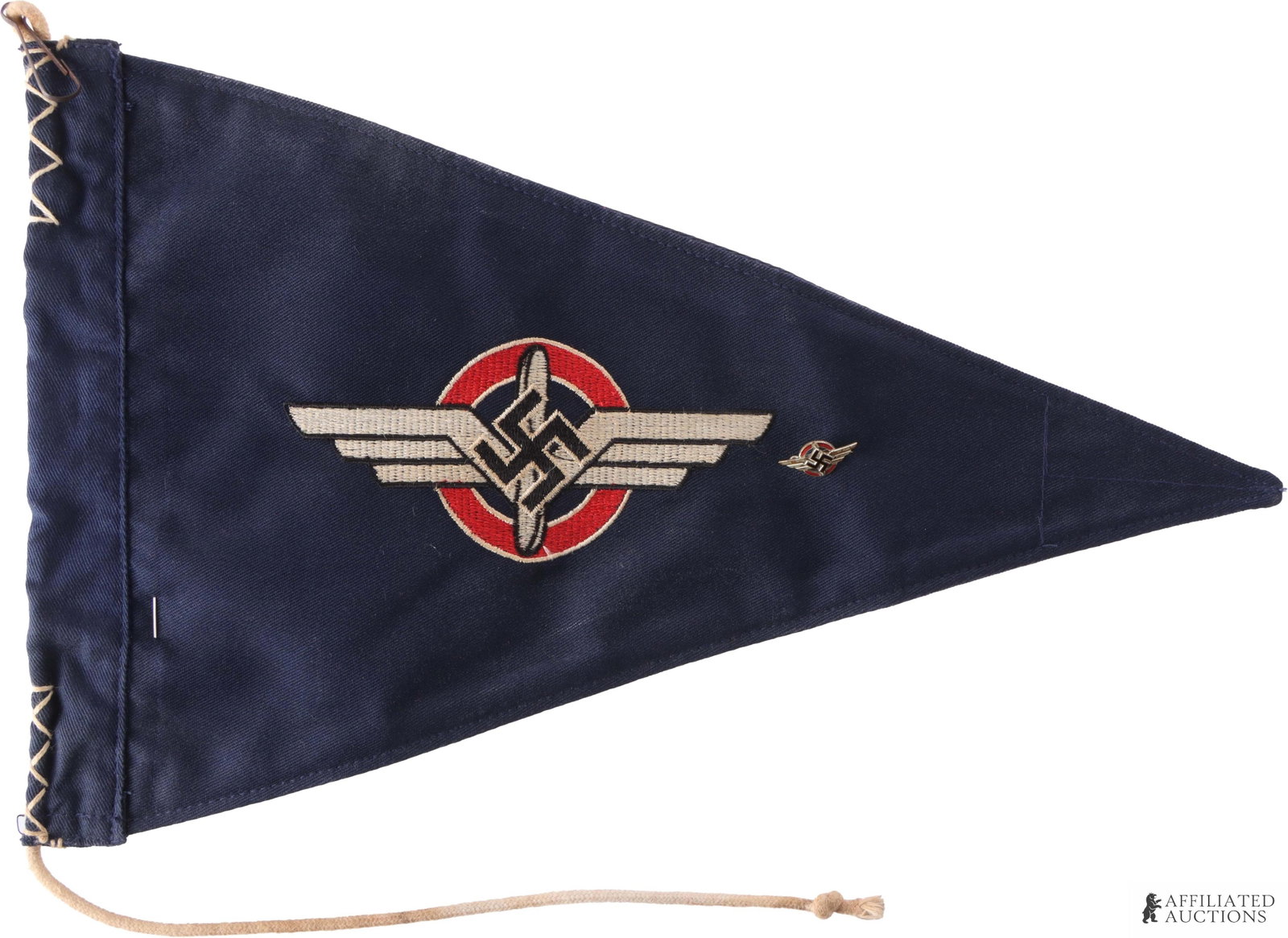 WWII German DLV Flying Club Pennant W Pin: German Third Reich DLV Flying club pennant. pennant. Double sided with small members enameled pin attached and a separate larger DLV buttonhole pin. Pennant measures 9 x 14 inches. | This lot has a re