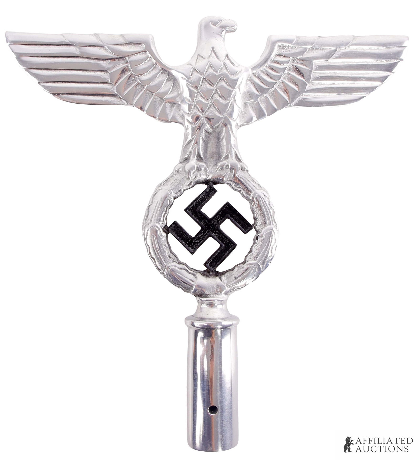 Reichsadler Flag Finial WWII German Third Reich: A finial for a flag featuring the Reichsadler of the German Third Reich. Eagle clutching a swastika Aluminum construction. 9.5x9.5 inches.