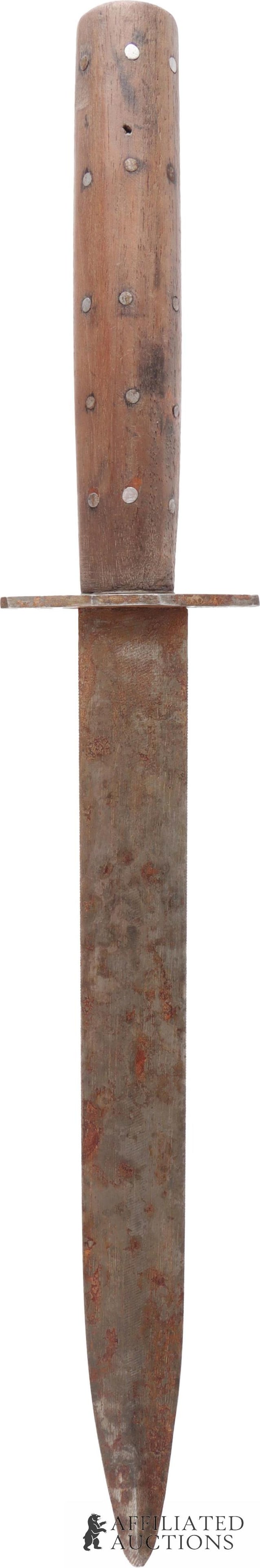 Antique Serrated Dagger Wood Handle 14" Knife: An antique dagger with micro-serrated edge, a straight hand guard and a wood handle. The handle has decorative steel inlay on both sides. 14 1/4" overall with an 8 3/4" blade.