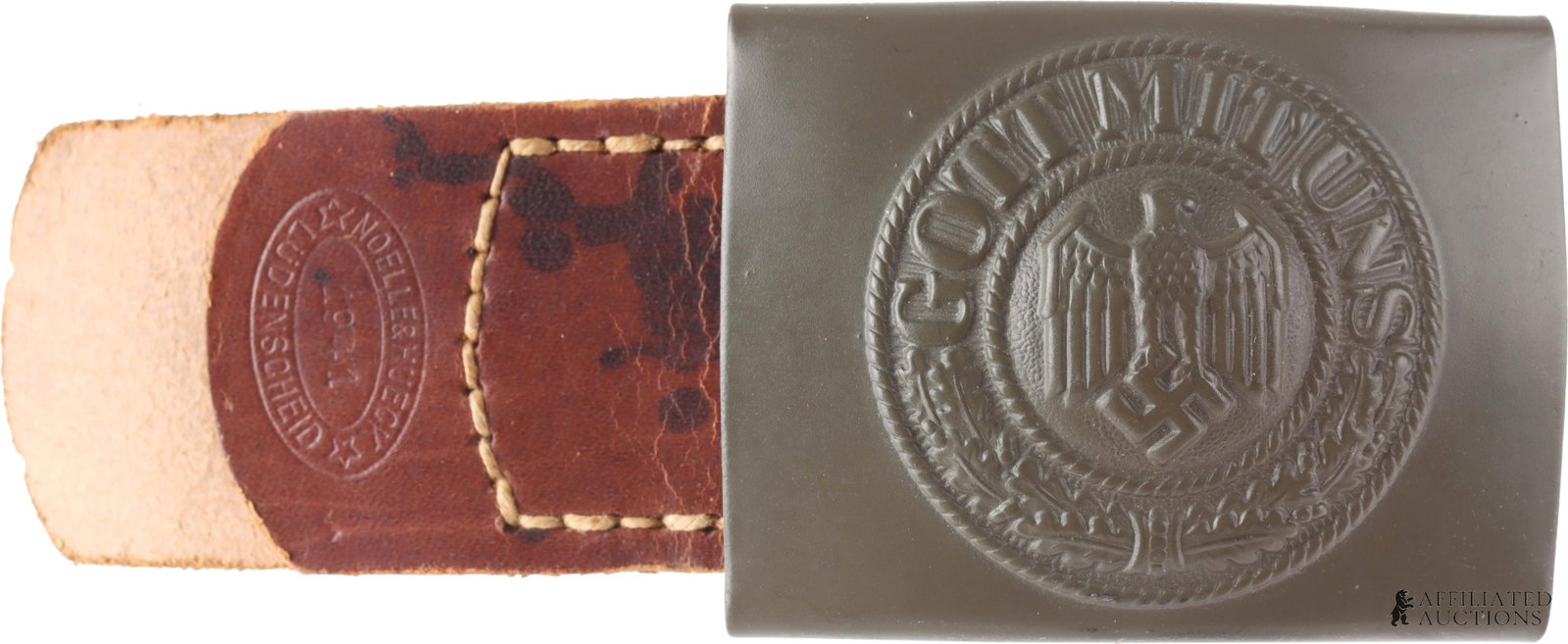 Wehrmacht Gott Mit Uns Belt Buckle WWII German: A belt buckle for the Wehrmacht of the German Third Reich, bearing the motto "Gott mit Uns." Smooth steel rings Reichsadler roundel. Roundel shows the Reichsadler, an eagle clutching a swastika. Steel