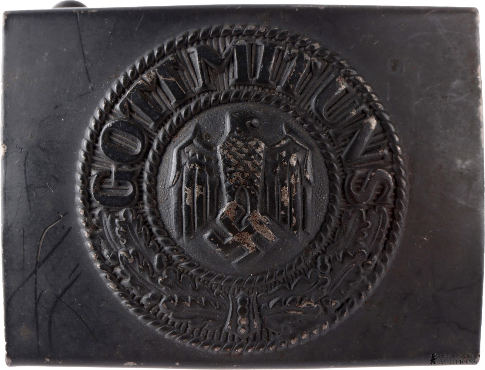 Wehrmacht Gott Mit Uns Belt Buckle WWII German: A belt buckle for the Wehrmacht of the German Third Reich, bearing the motto "Gott mit Uns." Smooth steel rings Reichsadler roundel. Roundel shows the Reichsadler, an eagle clutching a swastika. Steel