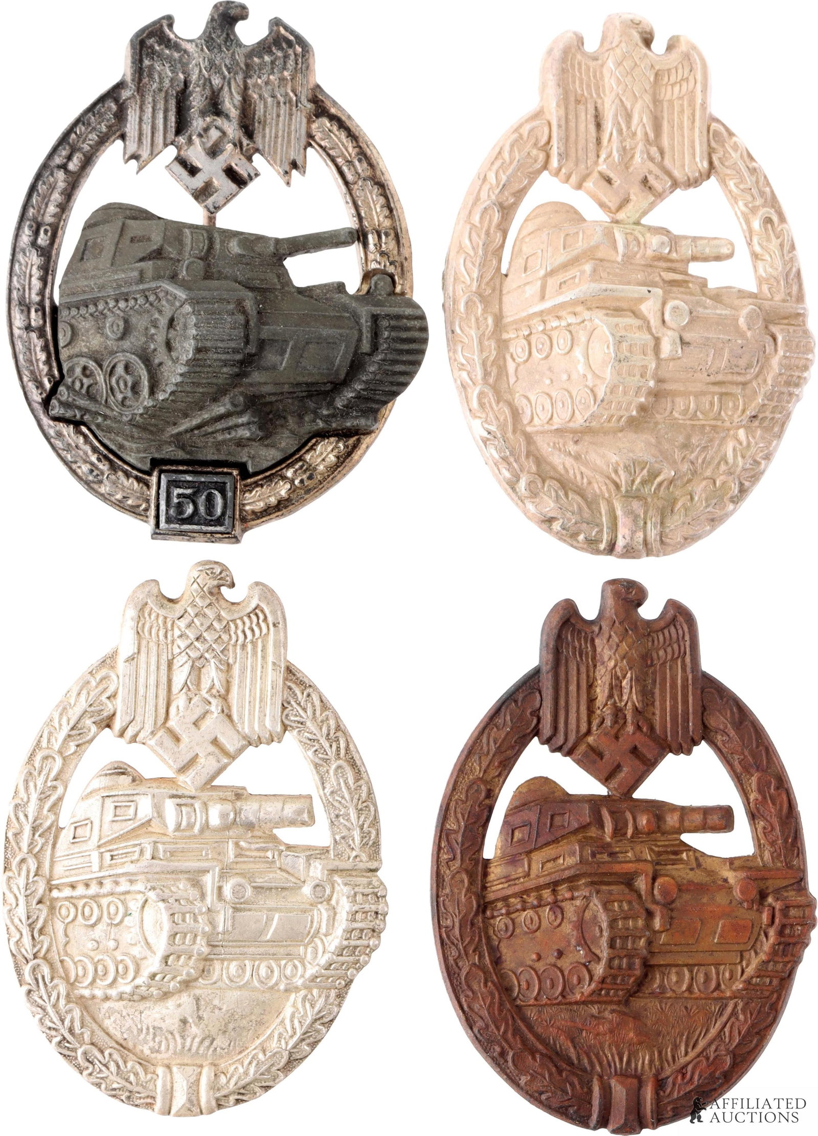 WWII 4 Panzer Assault Badges 50 Engagements: WWII German lot of four Panzer Assault Badges. One bronze grade from R.S. & S, two silver grade, one hollow type, and finally, one for 50 assaults. Measurements range 59 - 61mm.