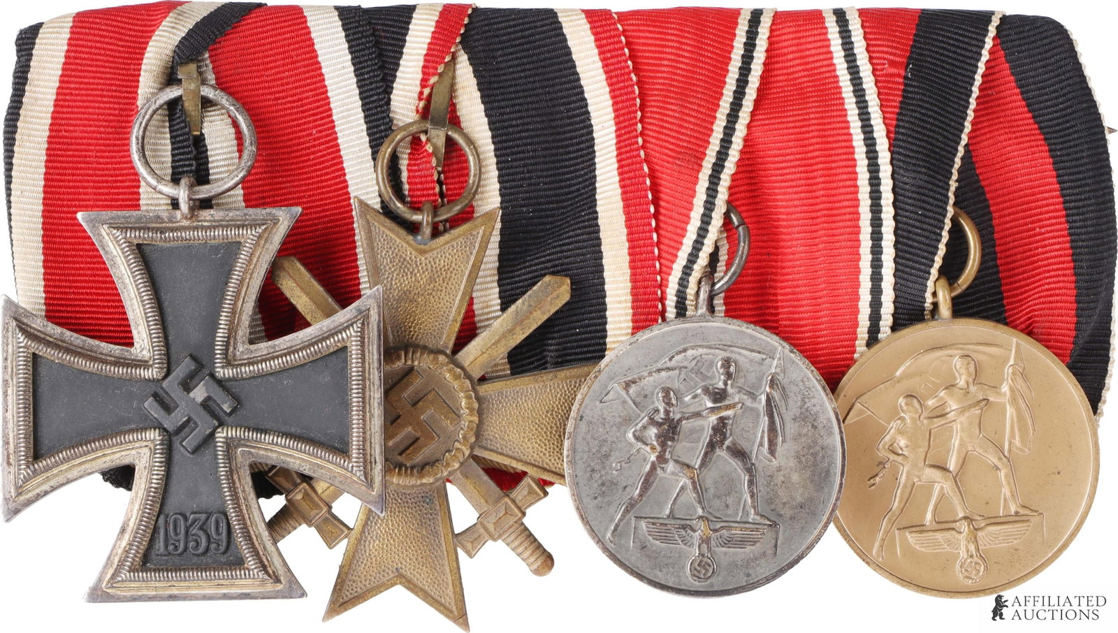 Spange with Iron Cross Second Class & Other Medals: A selection of four medals from the German Third Reich mounted on a spange. Iron Cross second class from maker Klein & Quenzer A.G. Stamped '65' on ring. Metallic, tests positive for silver, visible s