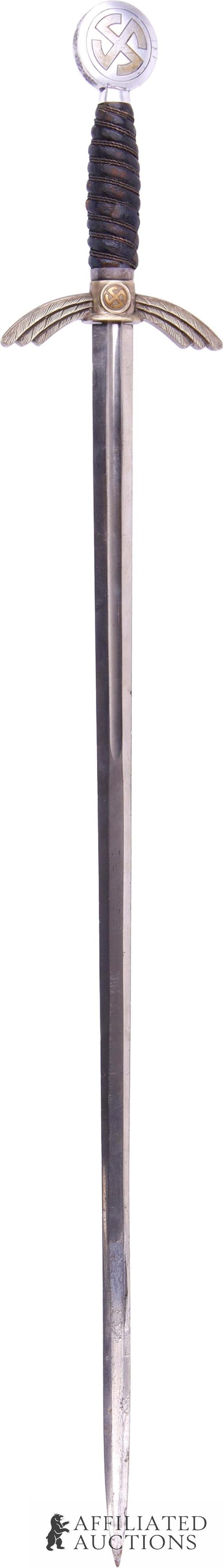 Luftwaffe Officer's Dress Sword WWII German Reich: An officer's dress sword for the Luftwaffe. Nickeled blade. Gold toned swastika on grip and pommel, round pommel. Two wings serve as the guard of the blade, Leather and wire grip. Marked for manufactu