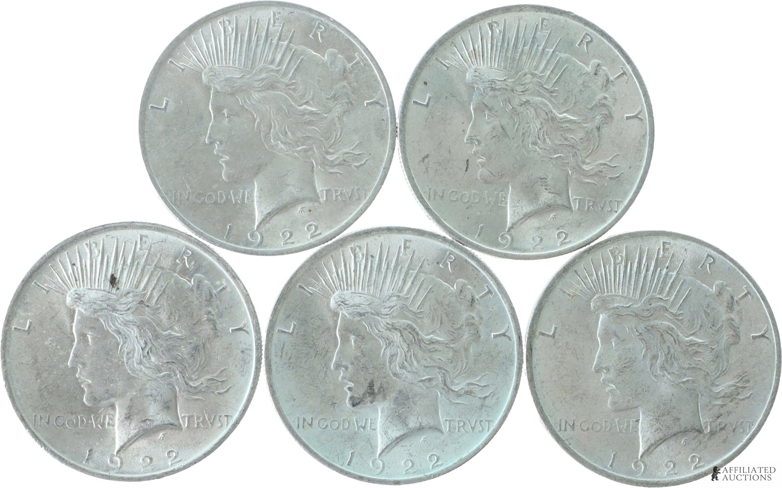 US 90% Silver Peace Dollar 1922 Lot of 5$5 Face: A selection of five (5) US 1922 90% silver peace dollars, showing a side profile of liberty on the obverse and an eagle on a rock bearing the word 'Peace' on the reverse. These are all choice specimen