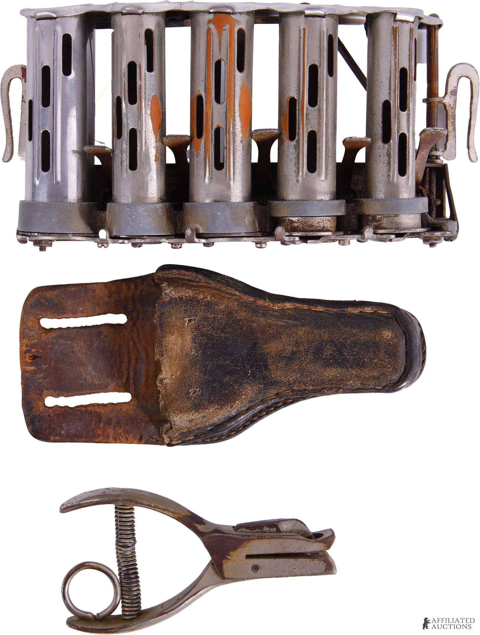 Vintage Railroadiana Ticket Punch & Coin Changer: A lot containing two pieces of vintage railroadiana. Includes 1) a McGill high speed coin changer distributed by J. L. Galef (marked on the top with maker and distributor); and 2) a vintage M. C. Miet