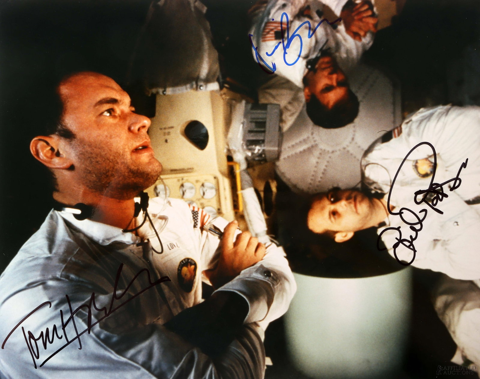 Apollo 11 Signed Photo Tom Hanks Bacon & Paxton: A still from the film Apollo 11 signed by Tom Hanks, Bill Paxton, and Kevin Bacon. This autograph was collected for James Reeves, who used a staff of agents to acquire signatures from celebrities whil