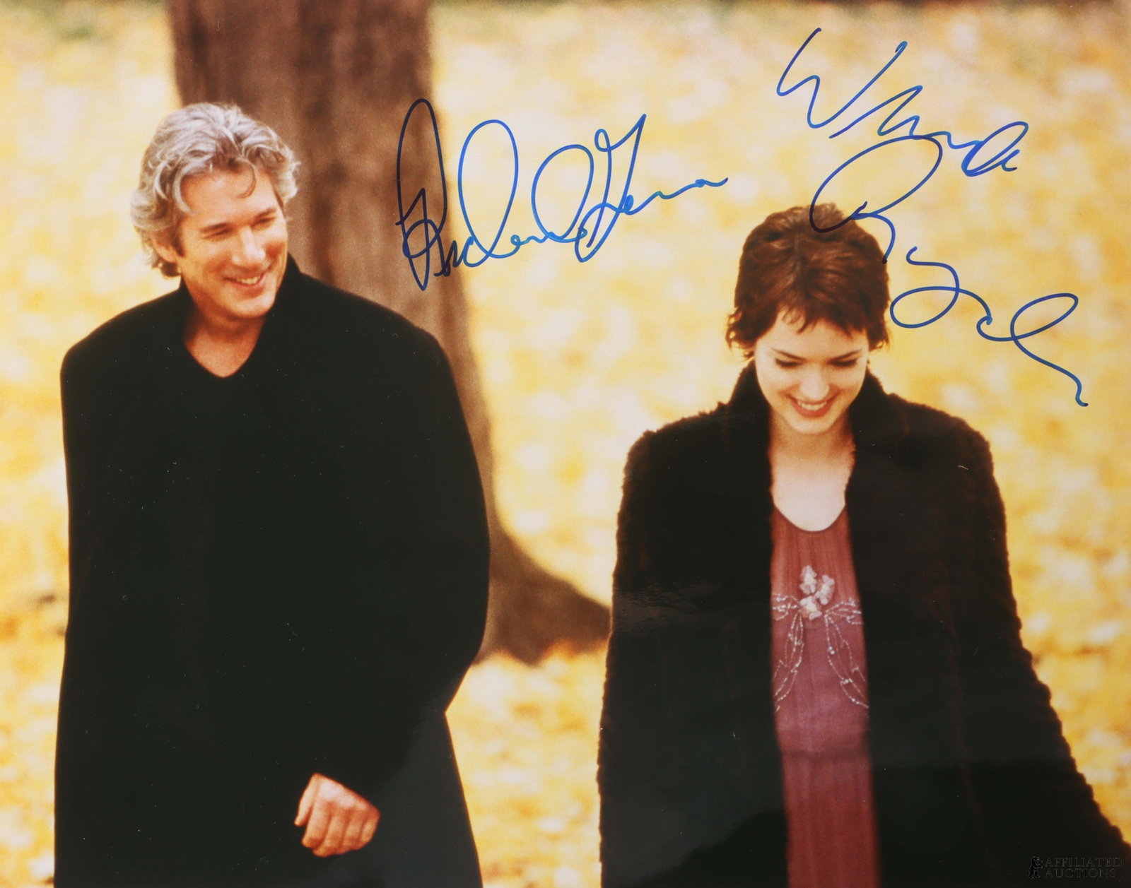Autumn in New York Signed Winona Ryder & Gere: A still from Autumn in New York, signed by Richard Gere and Winona Ryder. This autograph was collected for James Reeves, who used a staff of agents to acquire signatures from celebrities while running