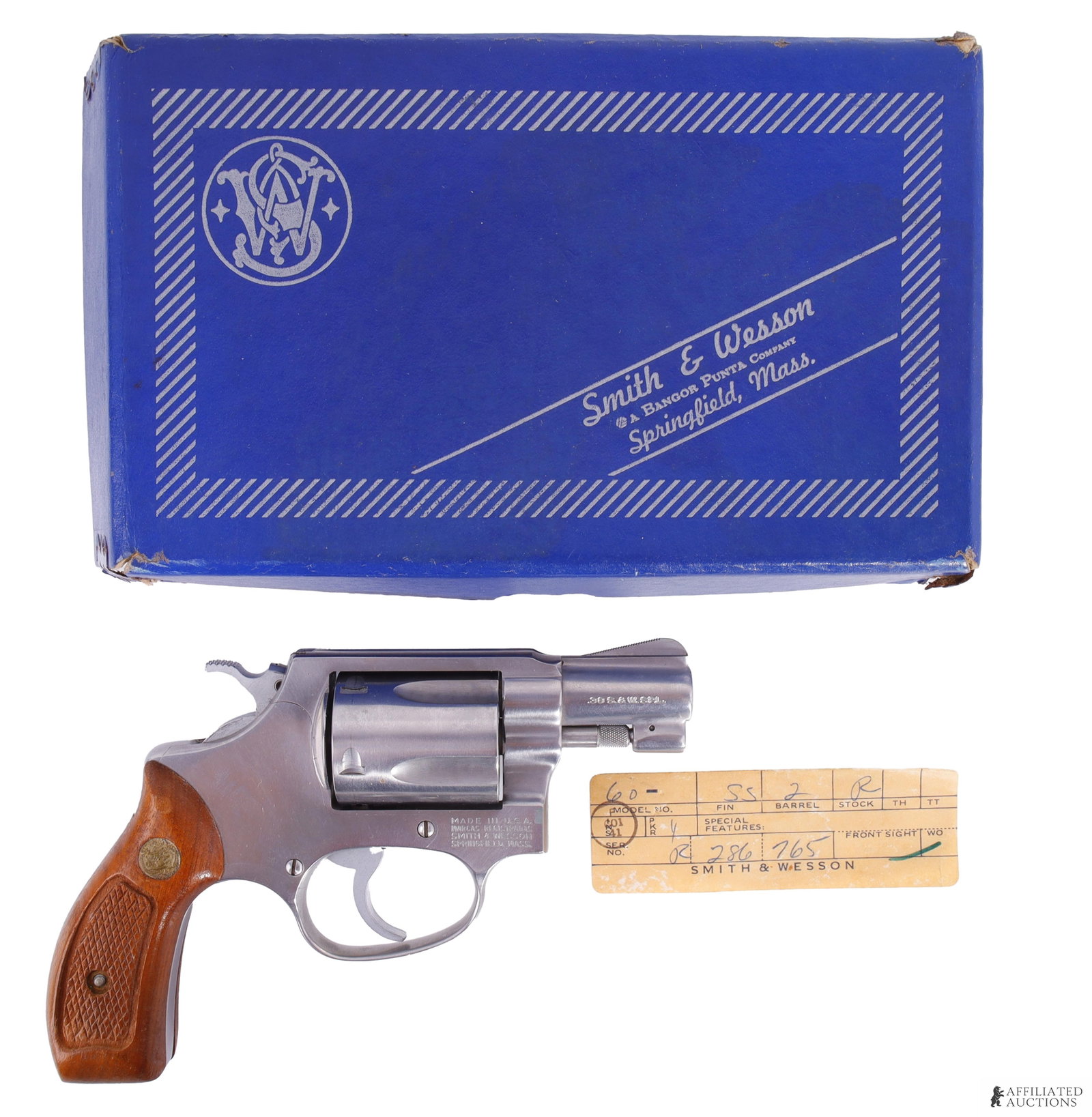 Smith & Wesson Model 60 Stainless .38 Spl Revolver: Smith & Wesson Model 60 Chief's Special Stainless Steel double-action revolver. Barrel length 2 inches. Weight 19 oz. Satin stainless finish with factory checked walnut grips. FFL or C&R required for 
