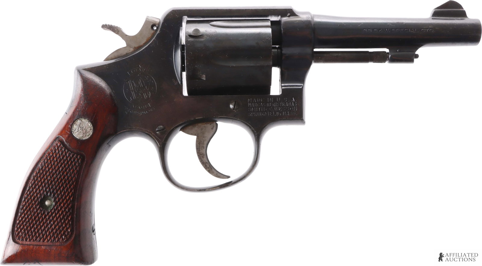 Smith & Wesson Model 10-5 .38 Special Revolver: S&W Model 10-5 double-action revolver. Production ca. 1969. Pinned 4-inch barrel. Capacity 6 rounds. Factory checkered wood grips. FFL or C&R required for transfer. | Caliber: 38 Special | Serial Numb
