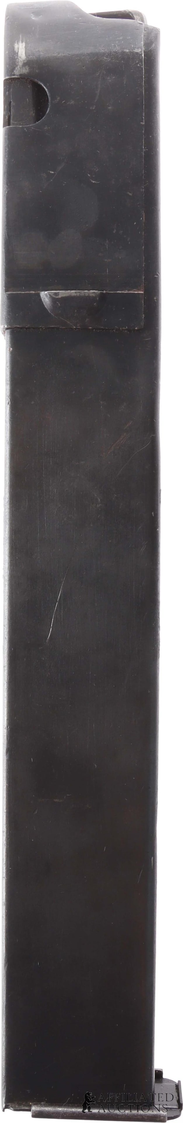 1940 German MP38u40 Detachable Box Magazine 98E: A 32-round, detachable slab-sided magazine for a 1940 German MP38u40 SMG. Stamped with maker code 98E, associated with Steyr-Daimler-Puch A.G., Werk Steyr (Austria). This lot has a reserve.