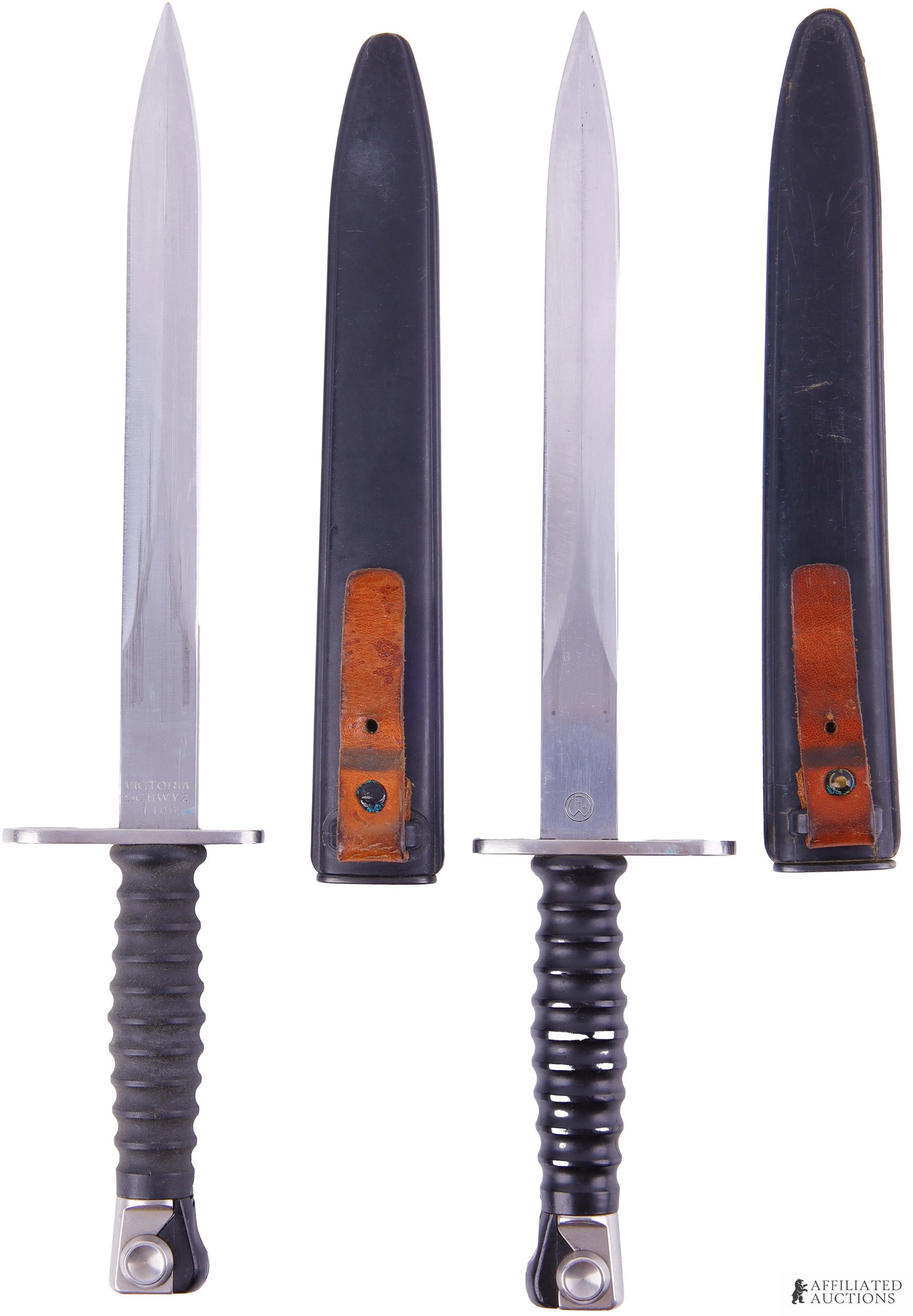 Lot of 2 Swiss M1957 Bayonets W/ Scabbards: Lot of two (2) Swiss M1957 Stgw. 57 Wenger bayonets with scabbards. The ricassos feature stamp marking Wenger on one and Victoria Schwyz on the other and the Bern acceptance stamp on the reverse. Desi