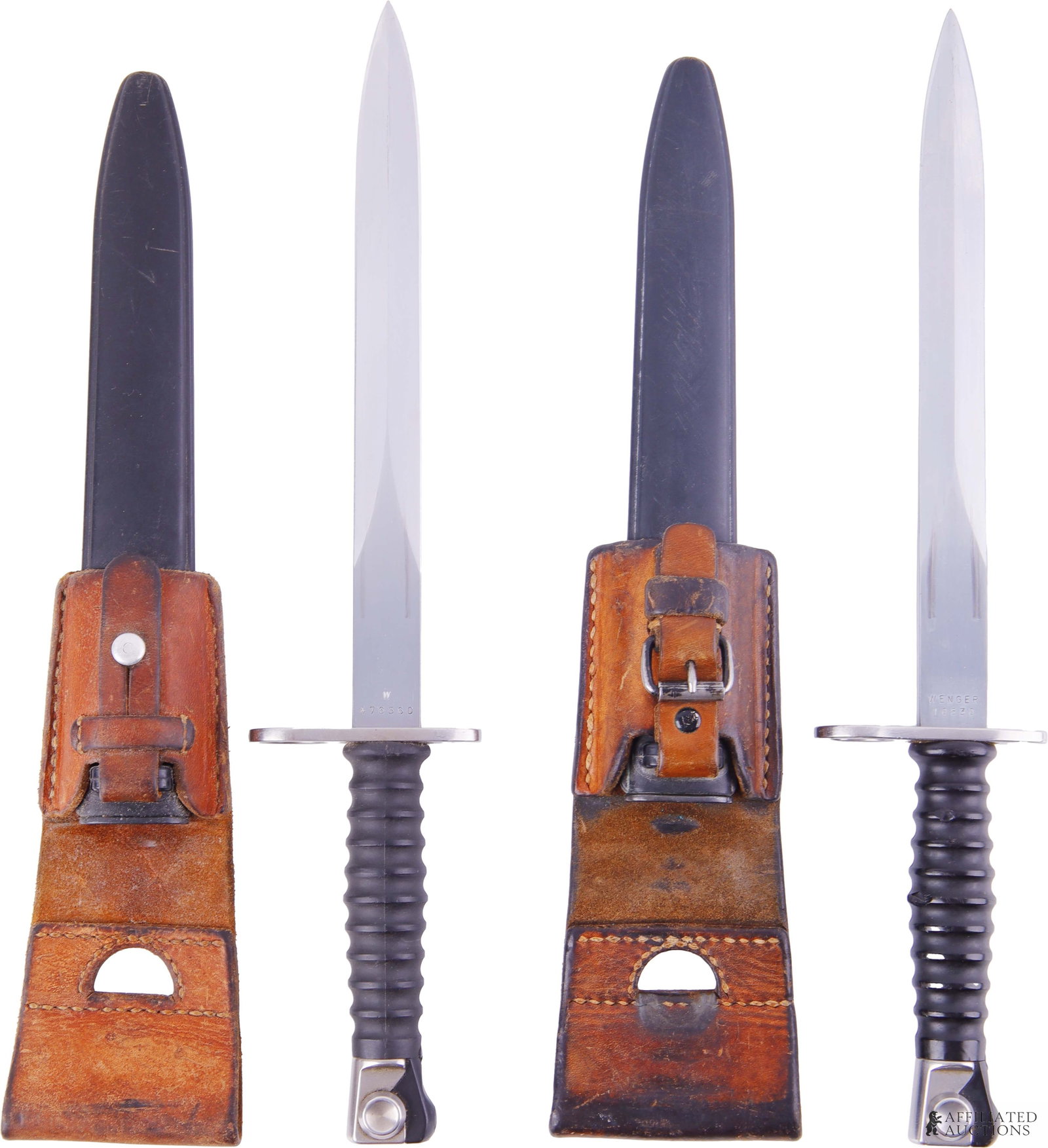 Lot of 2 Swiss M1957 Bayonets W/ Scabbards & Frogs: Lot of two (2) Swiss M1957 Stgw. 57 Wenger bayonets with scabbards and frogs. The ricasso features stamp marking Wenger on one side and the Bern acceptance stamp on the reverse. Designed for the Swiss