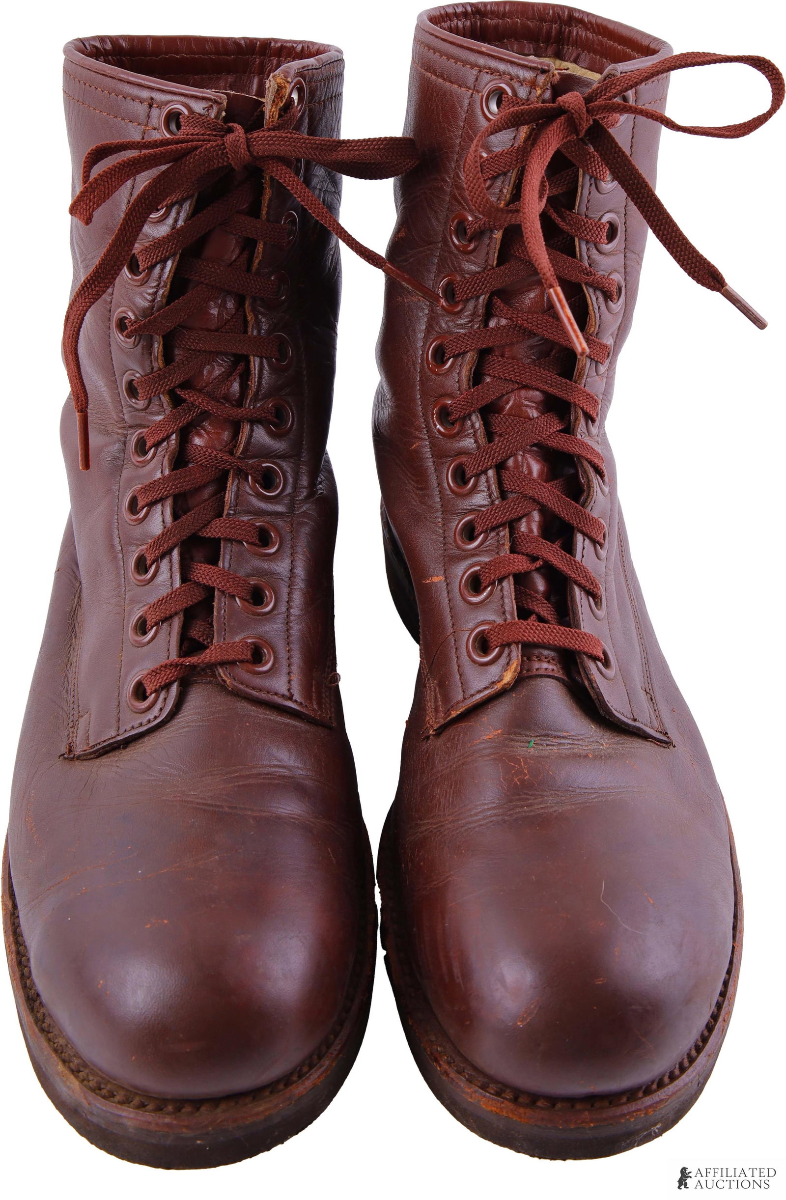 Vietnam War US Navy Pilot Flight Boots Size 8.5R: A pair of US Navy pilot flight boots, stamped on the inside with marker's mark 'H. H. Brown Shoe Co. Inc.' as well as manufacture date '27 Aug 1965'. Size 8.5R, maroon leather construction. This lot h