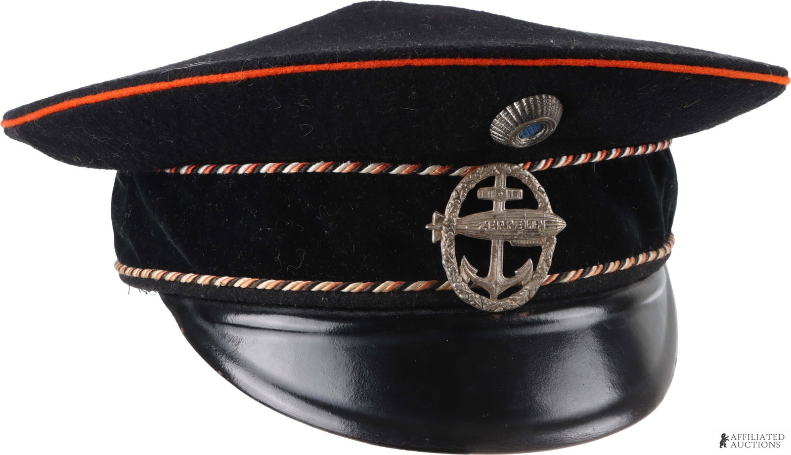 Imperial Era Naval Cap with Zeppelin Badge: German naval cap from the imperial era with blue naval cockade and die-pressed civil naval zeppelin badge. Measures 9.75 inches x 10 inches across.