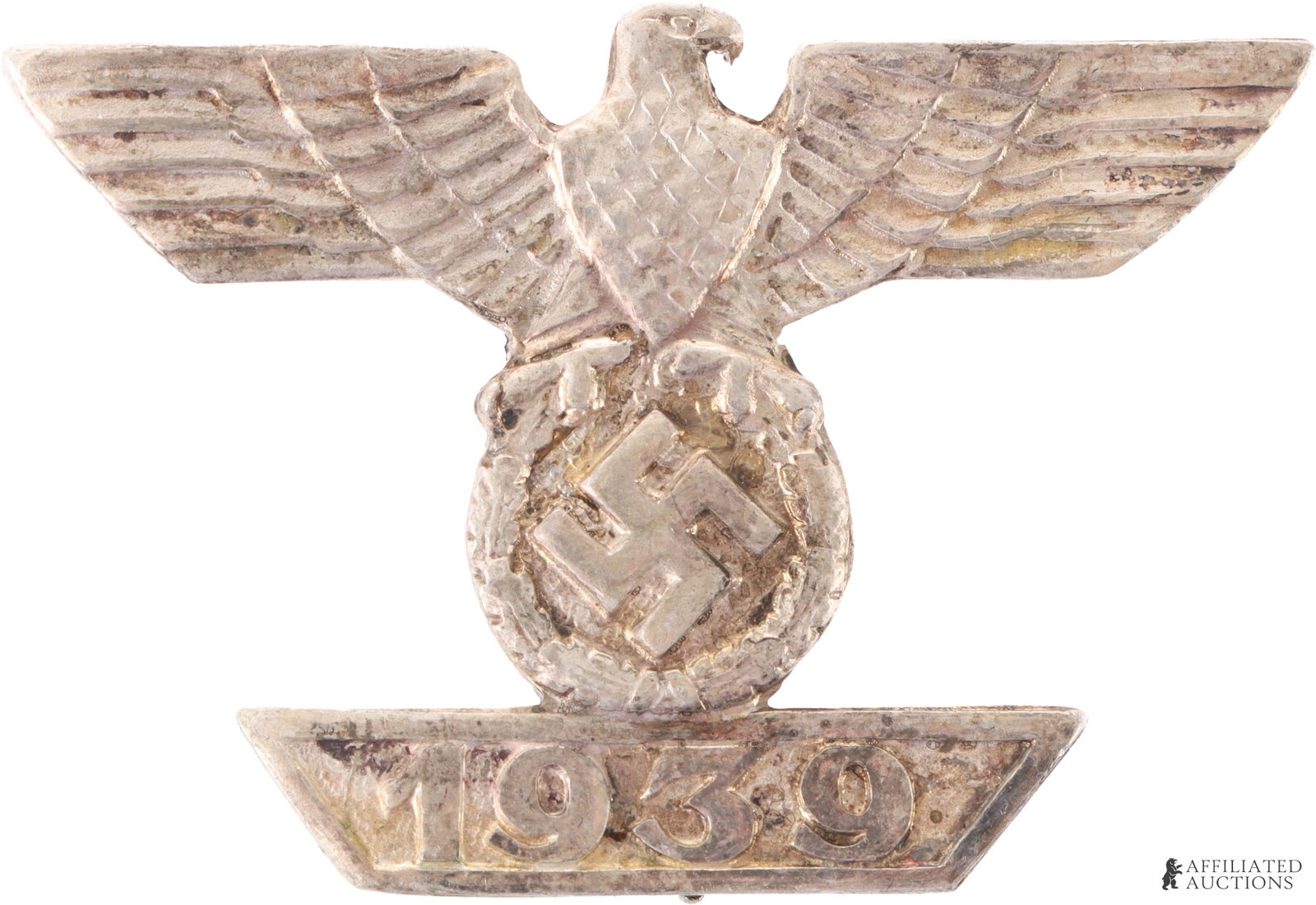 1939 Iron Cross Spange WWII German: Iron Cross Reichsadler clutching swastika and 1939. Reverse pin marked '20.' It measures 44.36mm.