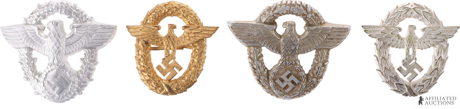 Lot of 4 WWII German Police Cap Badges: Lot of four polizei cap badges. Aluminum construction. One with brass gilt finish. They measure 42 - 45mm.