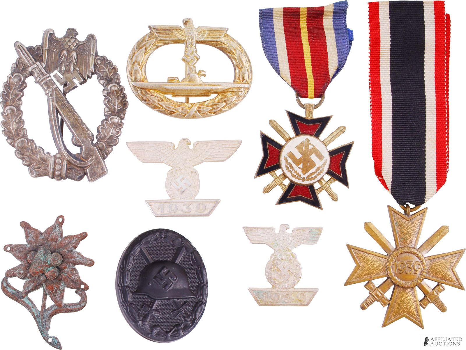 Assorted WWII German Military Medals and Badges: Lot contains eight (8) assorted German military badges and medals including U-boat war badge, infantry assault badge, edelweiss cap insignia, black wound badge, Mussert cross, war merit cross with swo