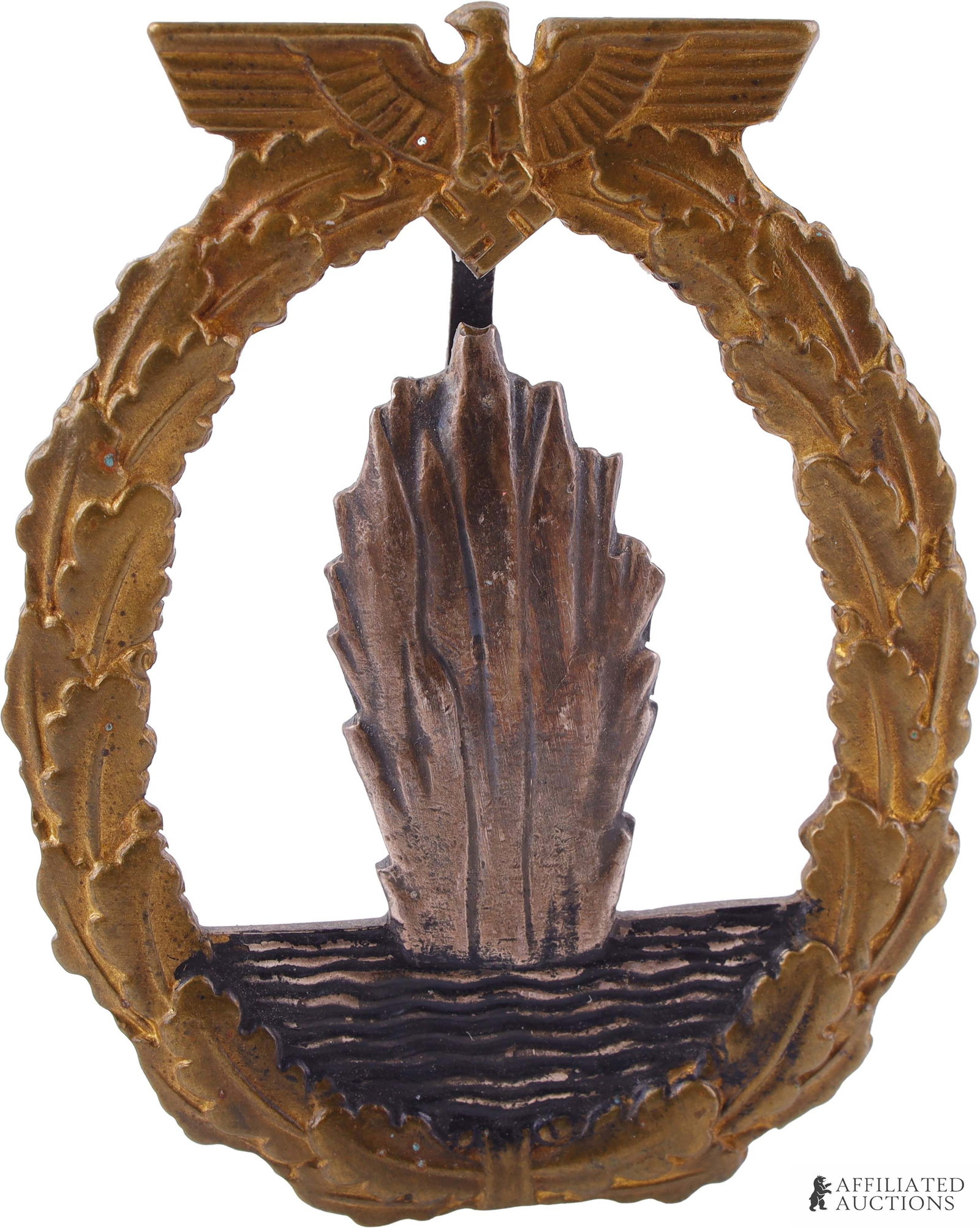 Kriegsmarine Mine Sweeper Badge WWII German: WWII German Third Reich Mine Sweeper badge. Tombak construction with brass gilt finish. 'FEC OTTO PLACZEK BERLIN AUSF. SCHWERIN BERLIN' marked on reverse. It measures 52mm.