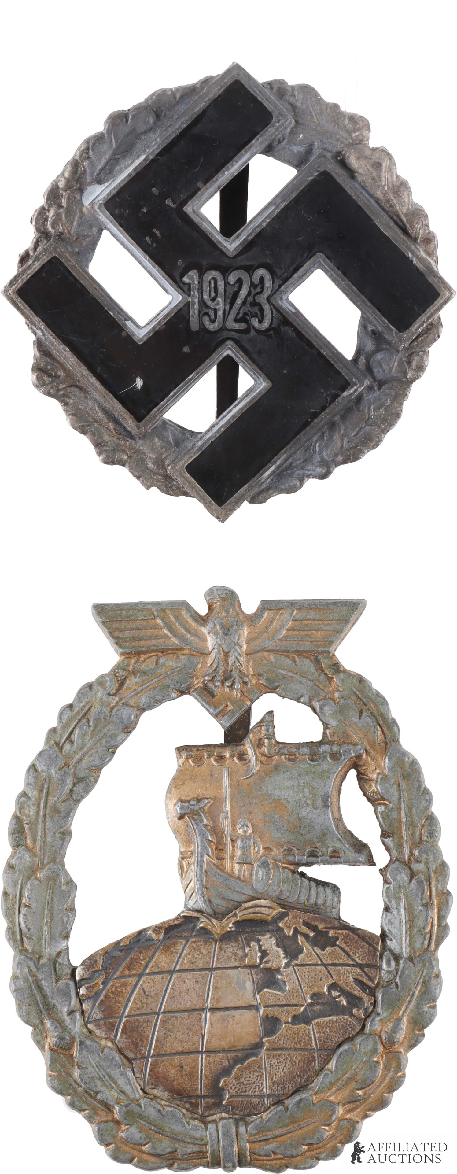 German Pin Badges Lot of 2 WWII Third Reich: A lot of two vintage German pin badges. Includes 1) an unmarked Auxiliary Cruiser War badge, which weighs 18.8 grams; and 2) a 1923 Geneal Gau Honor badge, issued to commemorate loyalty to the NSDAP, 