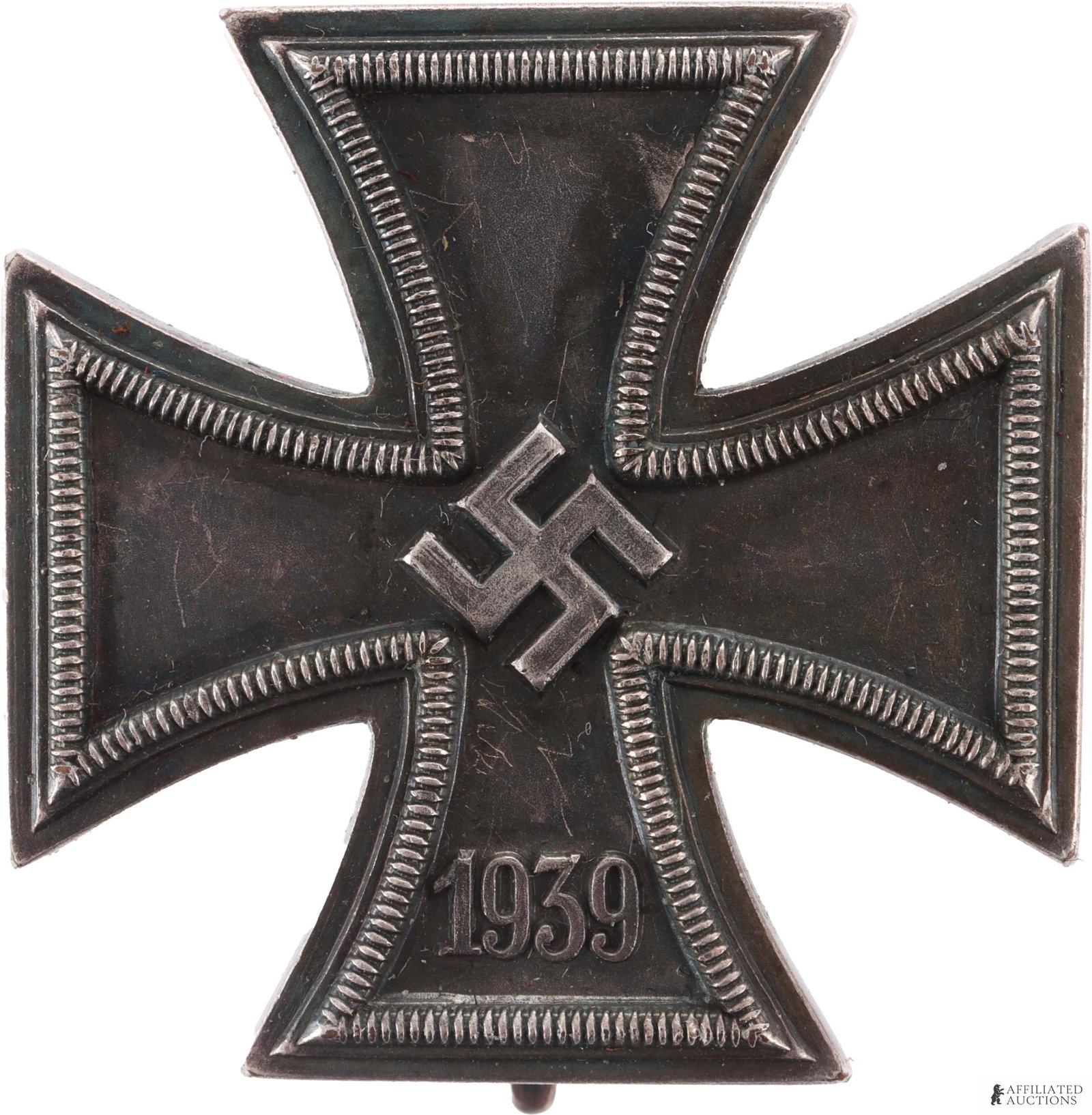1939 Iron Cross 1st Class Miniature WWII German: Miniature 1939 EK1. Silver alloy construction, non-magnetic. Reverse has tapered vertical pin on block hinge with round wire catch. Dimensions 28x28mm. Weight 11 grams.