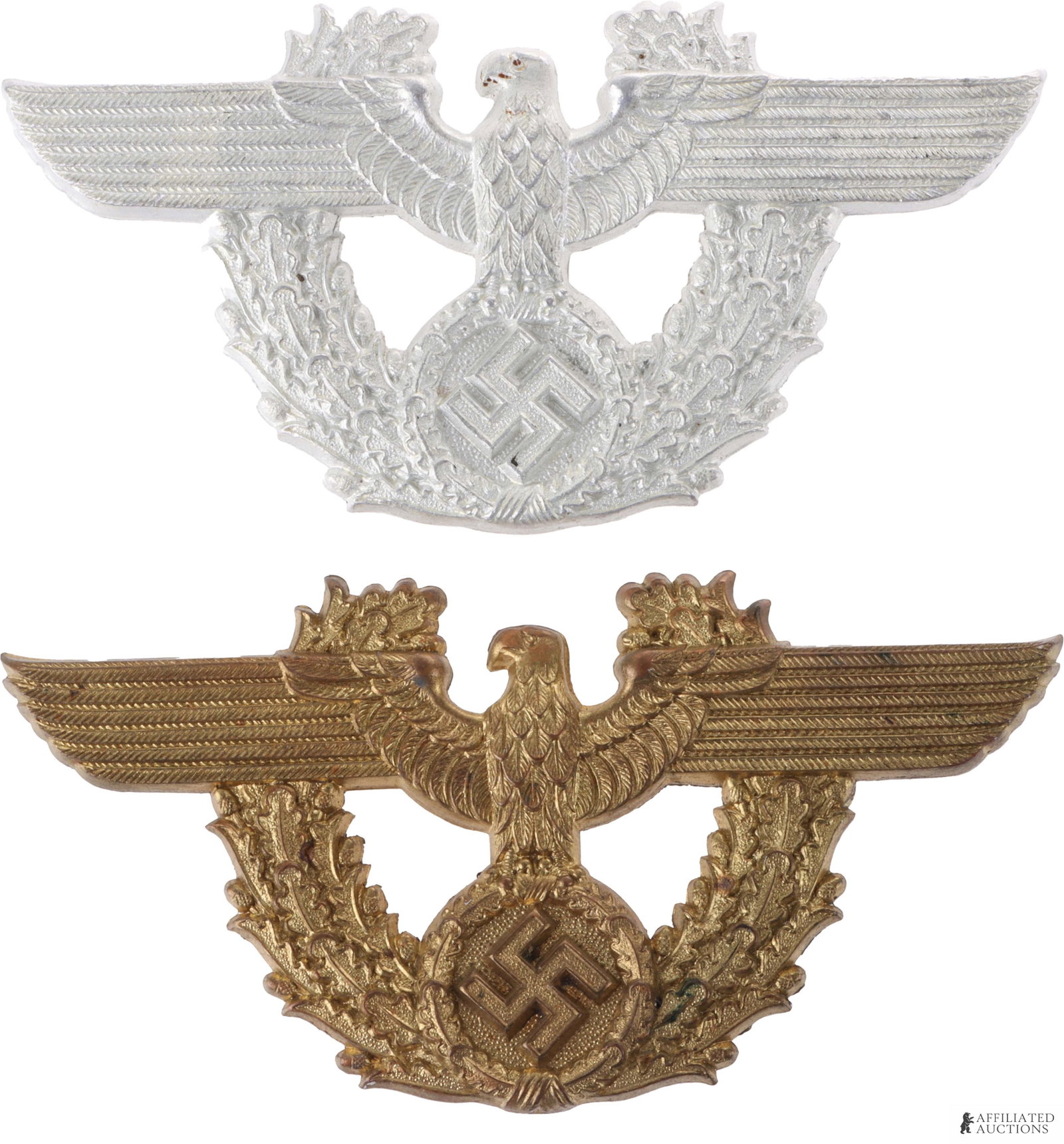 2 WWII German Reich Polizei Cap Badges: Both aluminum construction. One in bronze gilt finish. No maker's mark s on reverse. Both feature loops instead of pins. They measure 3 7/8 x 2 inches.