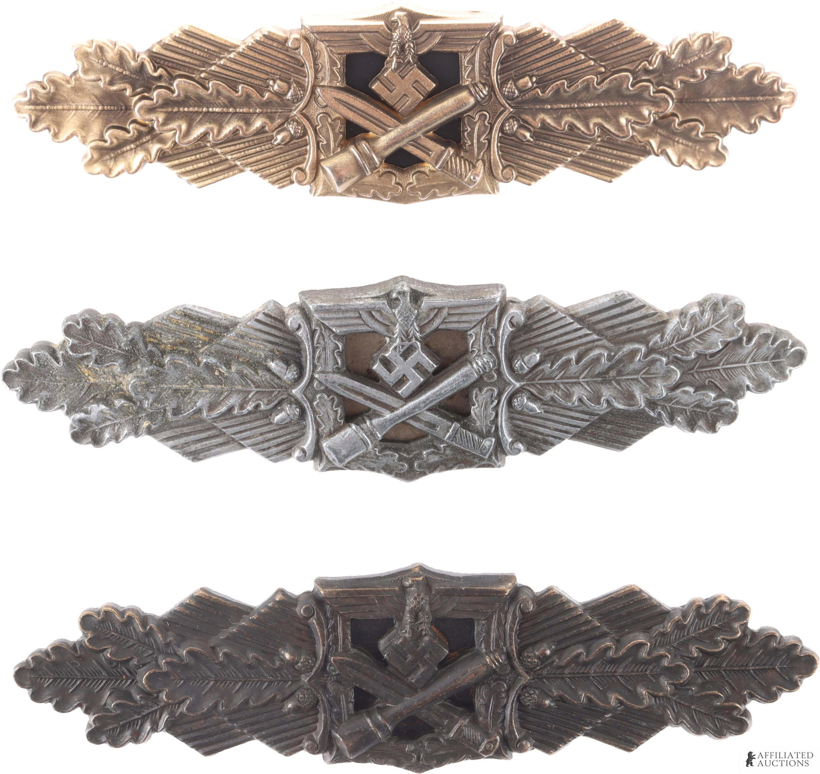 Close Combat Clasp Gold Silver Bronze WWII German: Lot features all grades for Close Combat Clasp. Eagle and swastika national emblem surmounting a crossed bayonet and hand grenade with, on each side, a spray of oak leaves. Reverse marked 'FLL' and 'F