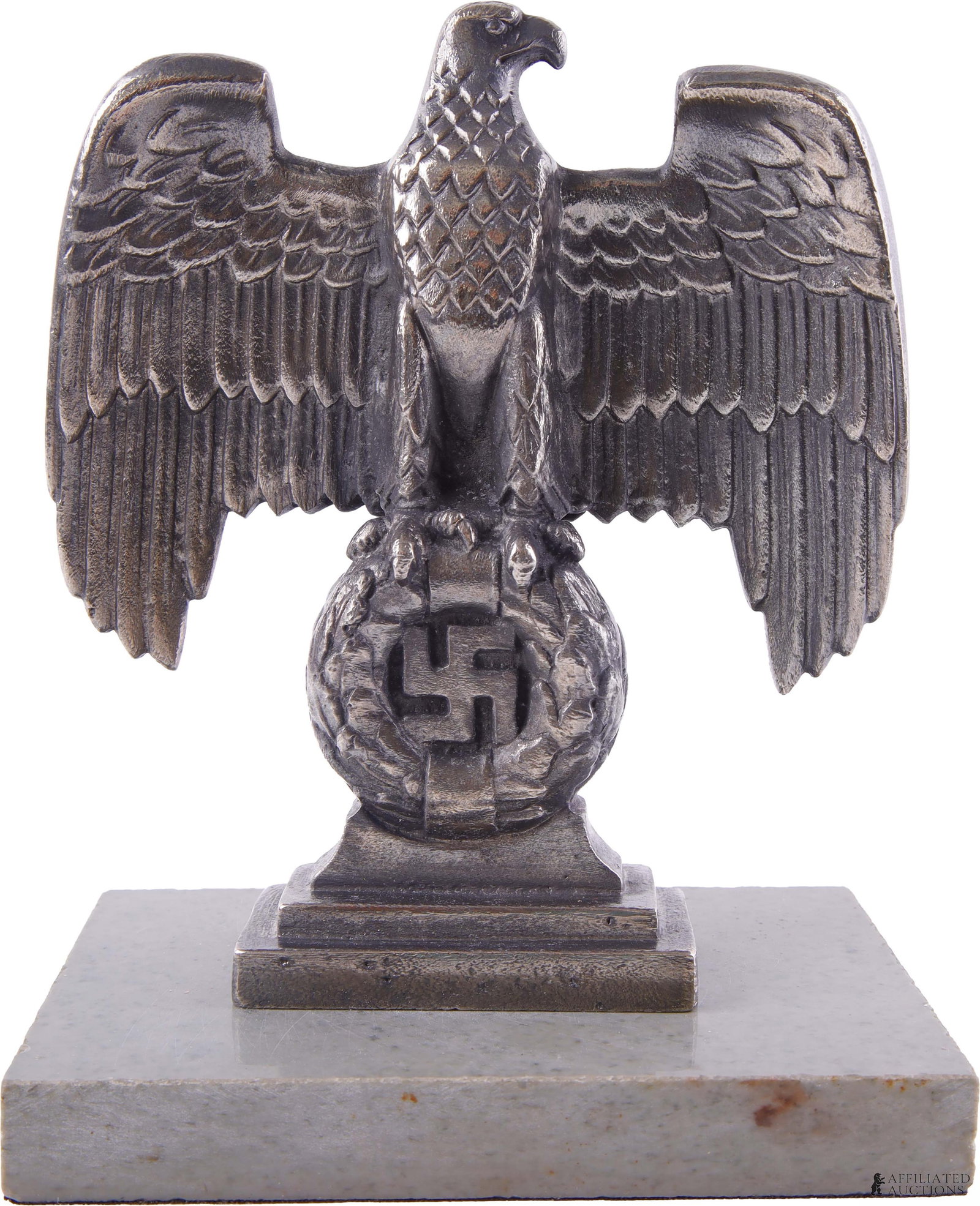 Desk Reichsadler WWII German Third Reich: A deck ornamentation symbolizing the German Third Reich, taking the form of a Reichsadler with an eagle clutching a swastika. 6x7.5x4 inches.