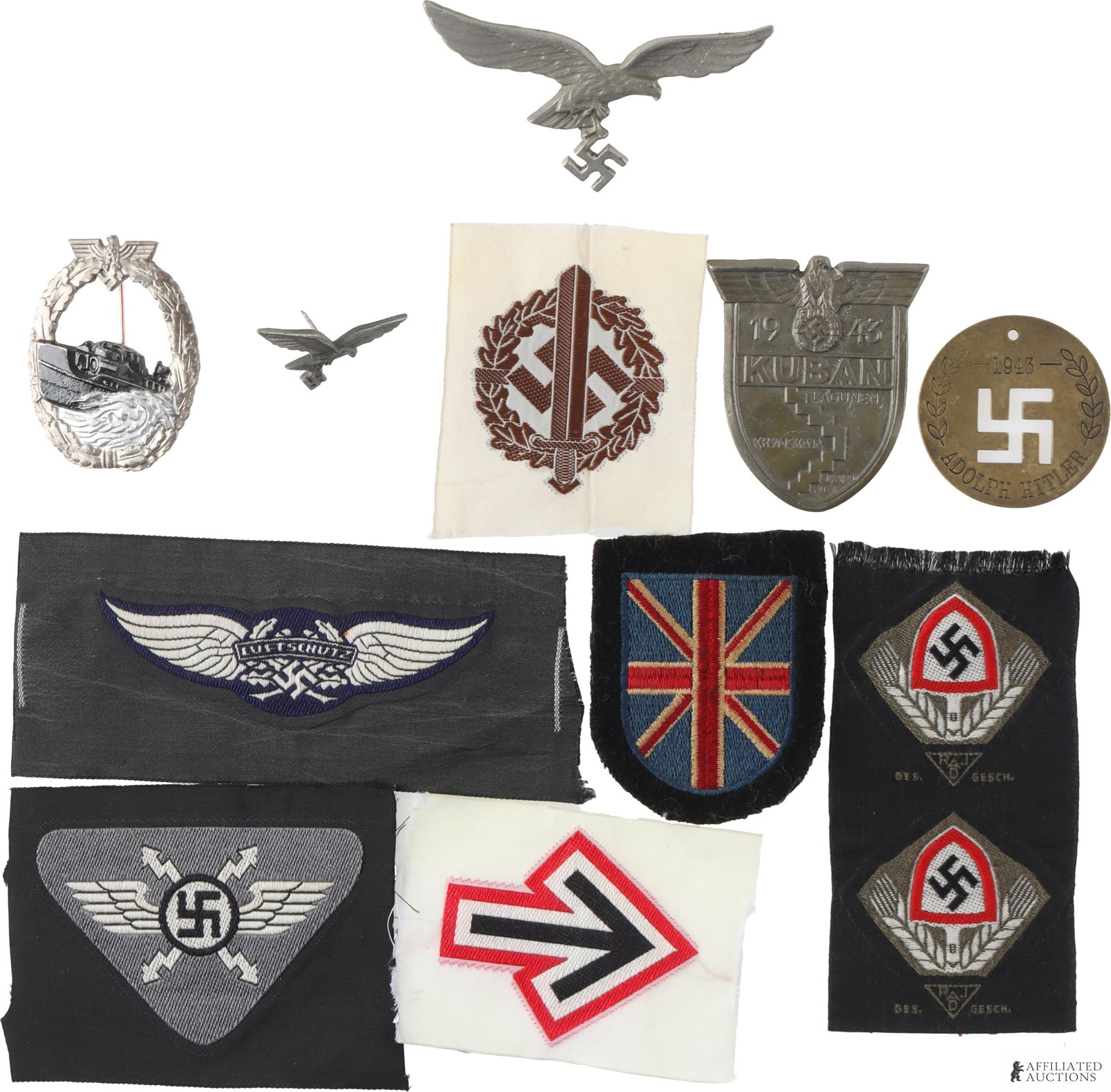 WWII German Military Insignia Large Lot of 11: A lot of assorted, unauthenticated WWII-era German insignia patches, pins, and medals. Includes: British Free Corps insignia patch; a pair of German RAD insignia emblems; a Waffen-SS signals sleeve di