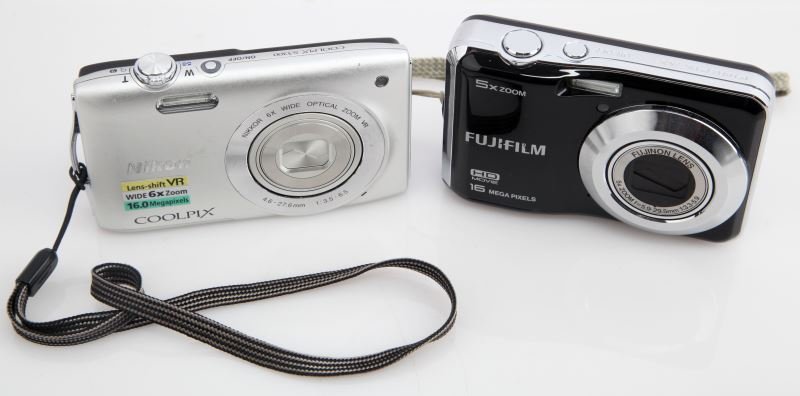 2 CAMERAS COOLPIX S3300 & FUJIFILM FINEPIX AX: The Nikon COOLPIX S3300 is a 16 MP digital camera with a 26 to 156 mm wide-angle NIKKOR lens. This Fujifilm FinePix 16 MP camera has a 5X zoom and a 5.9-29.5mm lens. Overall both cameras are in good t