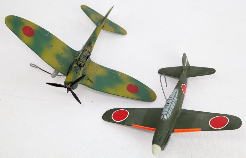 TWO PAINTED JAPANESE RECOGNITION SPOTTER MODELS: This lot includes a Japanese Judy made by Cruver, dated 3-45, and is painted to match a Japanese plane. The other is the Japanese "Val" Aichi it is also made by Cruver, and dated June 1942. The Judy i