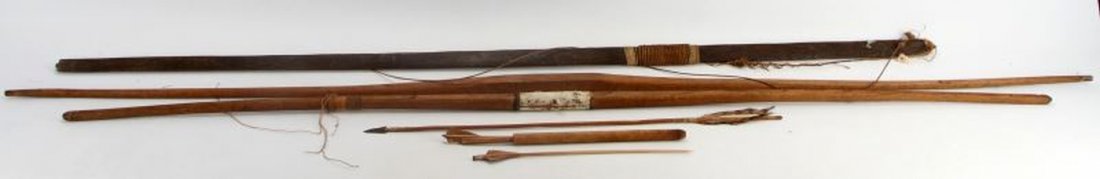 3 AMAZON BASIN TRIBAL BOW LOT WITH ARROWS: Arrows and quiver with three bows averaging about 58 inches each.