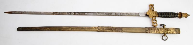 EARLY 20TH C KNIGHTS TEMPLAR CEREMONIAL SWORD: Early 20th Century Knights Templar Masonic ceremonial sword, by M. C. Lilley & Co, Ohio. Gilded hilt, with wrapped leather grip, knight standing in relief on pommel, and the Eye of Providence on guard