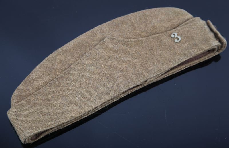 WWI UNITED STATES MARINE CORPS GARRISON CAP: French made garrison cap with time appropriate EGA. Minor mothing has occurred; overall in very good condition.