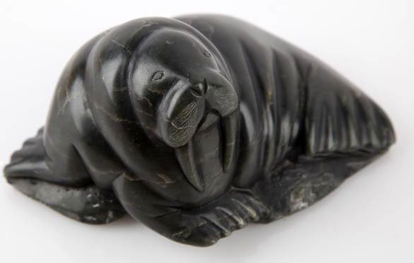 CANADA ESKIMO ART SIGNED SOAPSTONE WALRUS: With its original sticker on bottom signed "DI" NO. 518221, measures 3x6 inches.