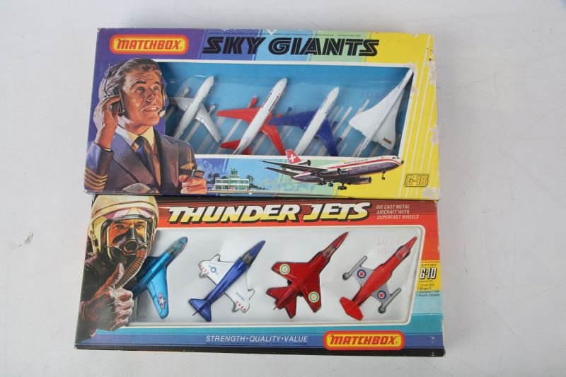 MATCHBOX SKY GIANTS G-18 & THUNDER JETS G-10: Both groups are in original box all eight planes look to be in very good condition with no playwear. Both boxes show slight wear.