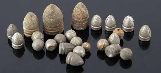 CIVIL WAR BATTLEFIELD DROP BALLS AND SHELLS: This group of battlefield drops includes eleven balls, three large shells, and eight pistol shells. All are in good to very good condition.