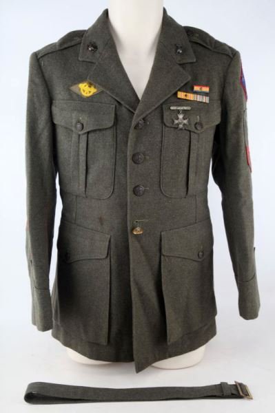 WWII USMC NAVY SEABEE GREEN WOOL MARINE TUNIC: First Marine Division tunic with U.S. Navy Machinist Mate 2nd class insignia, Seabee detachment, First Assault red felt First Assault backed patch, ruptured duck patch, ribbons and sharpshooter badge,