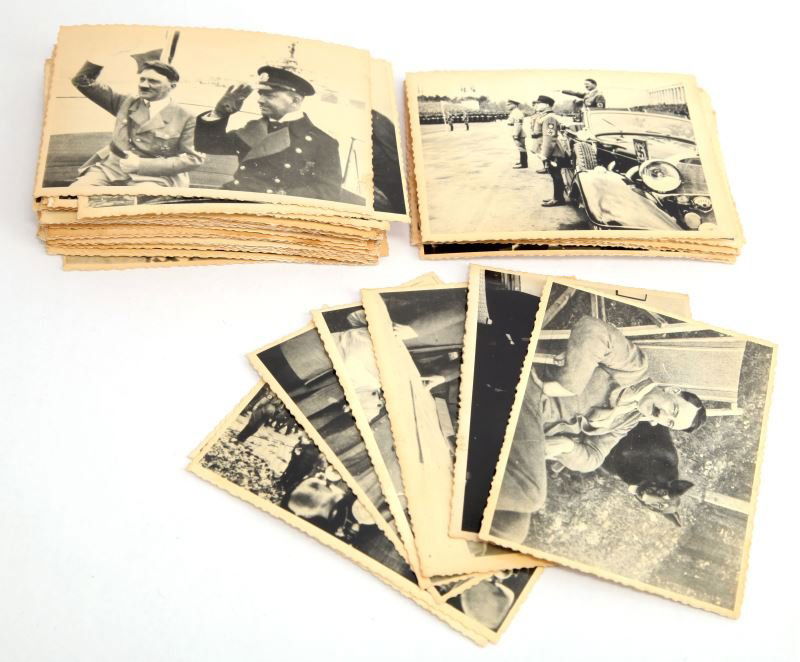 GROUP OF 68 PHOTOS OF HITLER AT VARIOUS OUTINGS: All photos have the been stamped "removed from the register" and have an oval stamp of the special fund of the Russian Ministry of Internal Affairs. Photos are of Hitler at various political events an