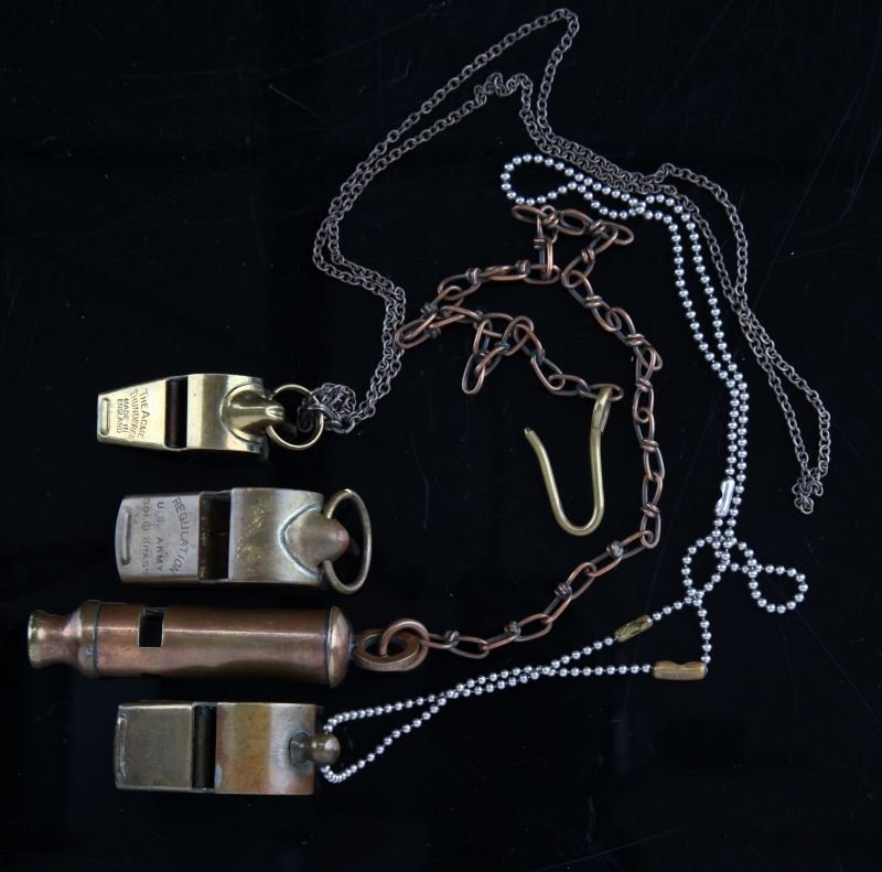 WWI US & ENGLAND TRENCH WHISTLE LOT OF 4: All in very good condition. includes Horstmann trench whistle with chain, plain USMC style WWI, Regulation U.S. Army solid brass, and a Gemsco Acme Thunderer.