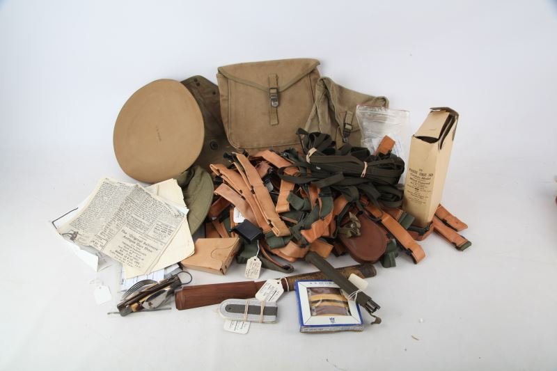 UNSEARCHED LOT OF US MILITARY ACCESSORIES: Unsearched lot of helmet straps, shoulder boards, and more. Range is from good to very good condition.