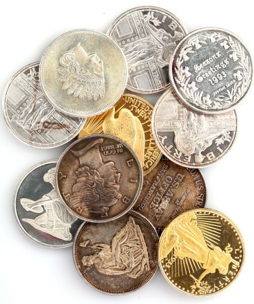 LOT OF ELEVEN ASSORTED ROUNDS .999 SILVER COINS: Lot of eleven assorted 1 troy ounce .999 fine silver coins. Items are in good to very good condition.